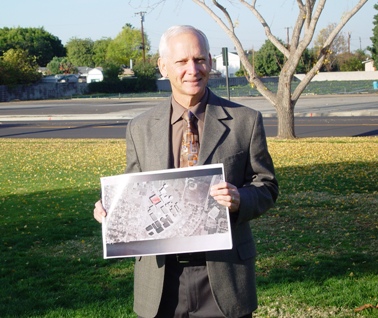 Holding Court: Bonita Principal Bob Kerterling holds the plans to proposed new gymnasium on the Bonita campus, set back about 20 feet from D Street.