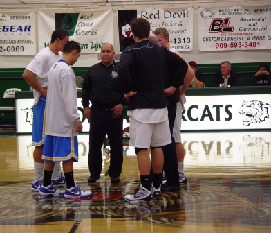 Bonita sends out Erik Woodruff and Casey Horine to center court before the start of the game.
