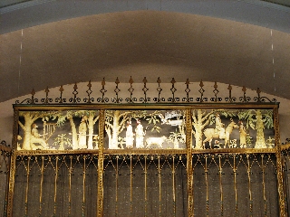 Pictorial panel at the top of the pipe organ screen