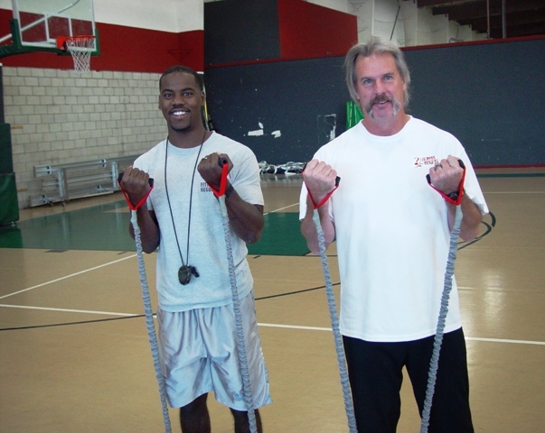 Rodney Harris and Ken Harsha may be football tough, but they extremely patient and professional in helping boot campers reach new levels of health and fitness.