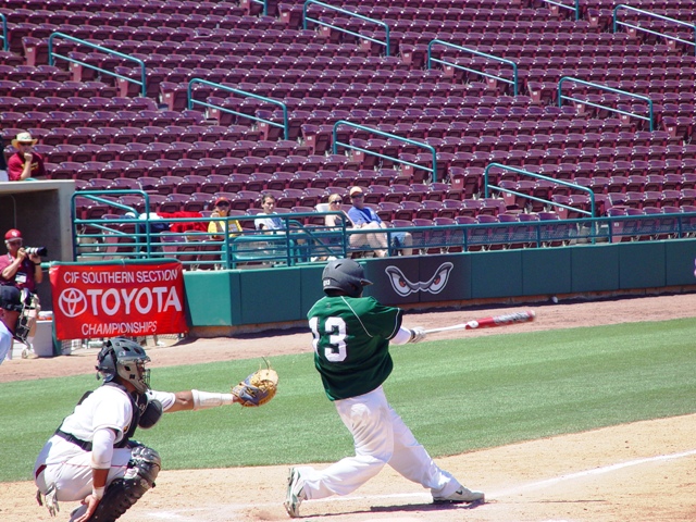 Greg Victoria smashes a double down the line in the top of the fifth.