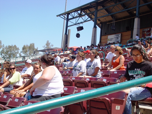 Bonita fans were scattered throughout the ballpark, many taking refuge in the shade. These hardy souls grinned and bared it.