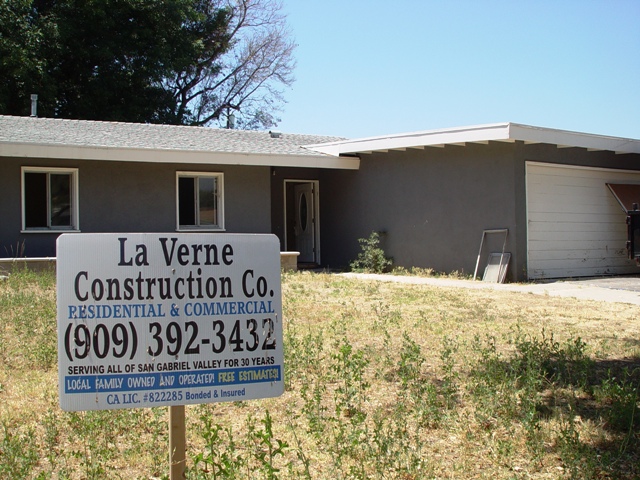 Soon neighbors won't recognize the home now being renovated and remodeled by La Verne Construciton.