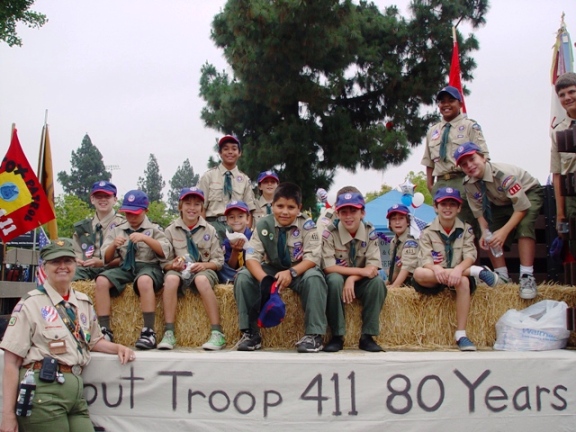 Now if Marcia's is celebrating 25 years of scouting and Troop 411 is celebrating 80 years of service, what percent of time has Marcia served as the troop's scoutmaster? Can someone please call La Verne's math whiz, Ian Sigsworth, to get the answer.
