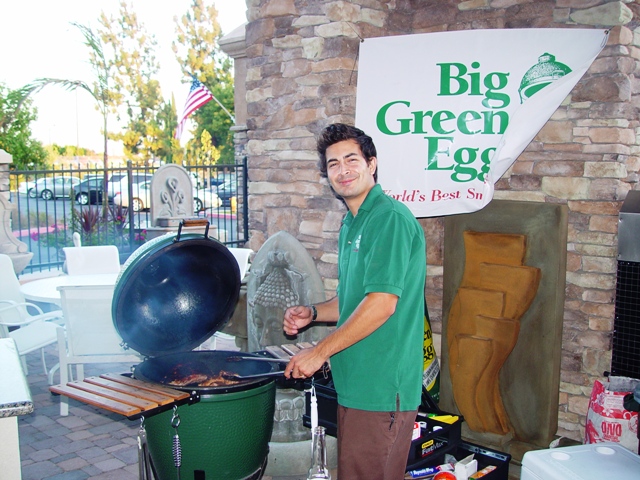 Outdoor Elegance owner Doug Sanicola handed off the barbecuing chores to Anthony, who reps the Big Green Egg.