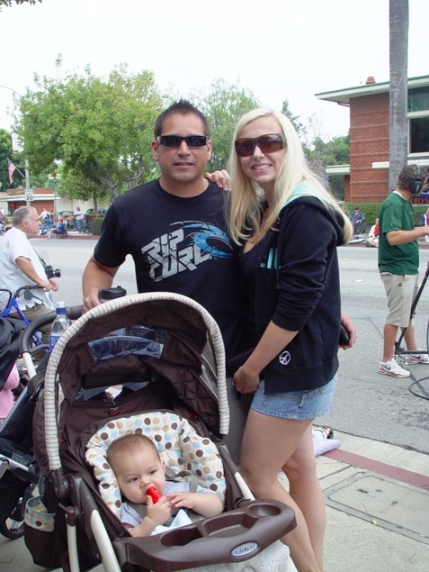 That's Ed Rodriguez, III, sales manager for Century 21 Marty Rodriguez, with his lovely wife Nicole and son Aiden.