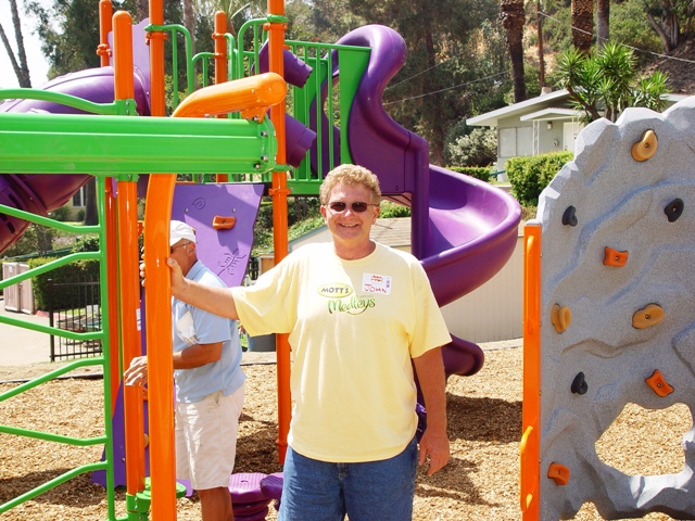 John volunteered his time to help build a new playground for the LeRoy Haynes Center.