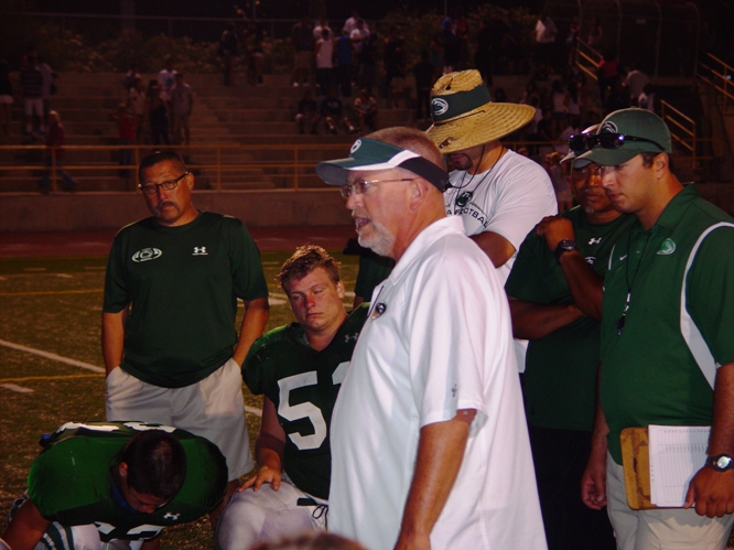 Bonita Head Coach Eric Podley addresses the Bearcats moments after the scrimmage against Damien High School.