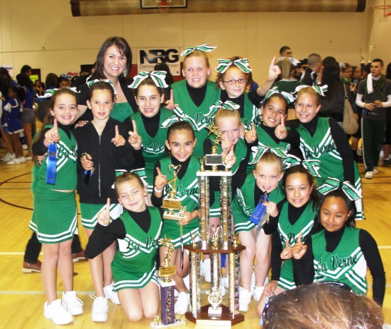 Mighty Mustangs: Cheer squad hauled home the hardware after a recent competition.