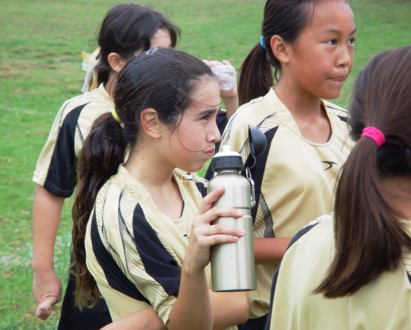 Tara Pina, with water bottle, scored the Golden Champs' first goal.