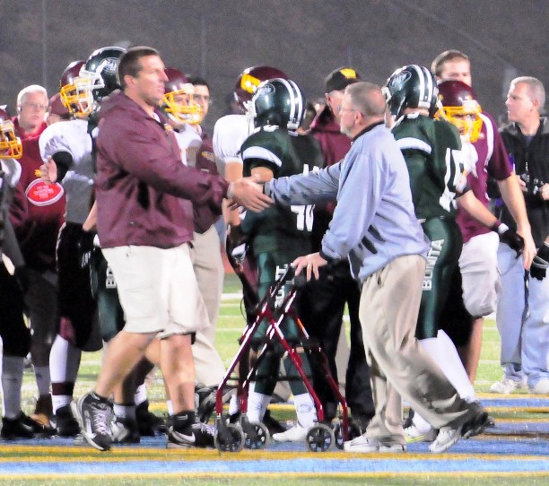 Meeting of the Minds: Eric Podley and West Covina Mike Jaggiore coach shake hands after the game -- and what a game it was!