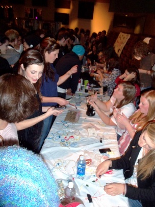 Local artists were busy applying henna tattoos, making bracelets and painting toms.