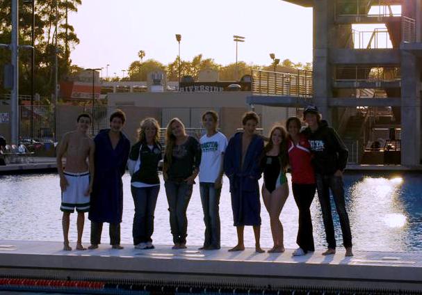 Dry and Determined: From left, divers Dylan Galindo,Jake Manning, Coach Olivia Palmer, Millie Moro, Tatiana Saucedo, Luke Manning, Elyse Smith, Melyssa Trilles & Kyle Mcknight.