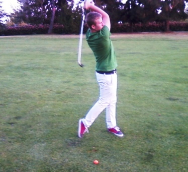Just ignore Rob’s orange golf ball.   He didn’t miss it.   This was only a practice stroke.