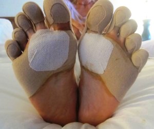 Foot specialist Denise Jones patched up the pounded toes and soles of many runners.