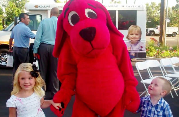 Clifford the big red pup with a couple of his friends.