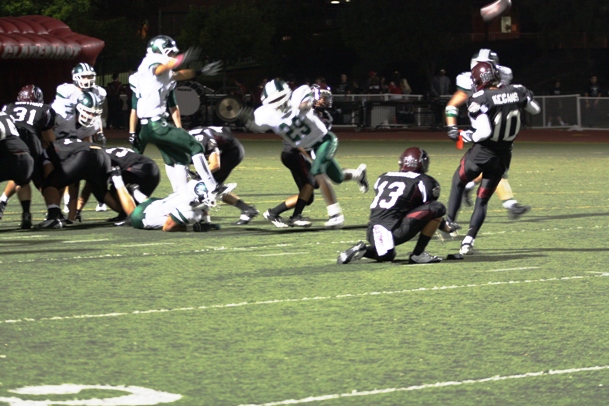 Toure McCulley crashes in to block field goal attempt.