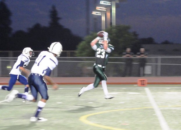 Garrett Horine demonstrates his catch-and-run move, a step he repeated for four touchdowns.
