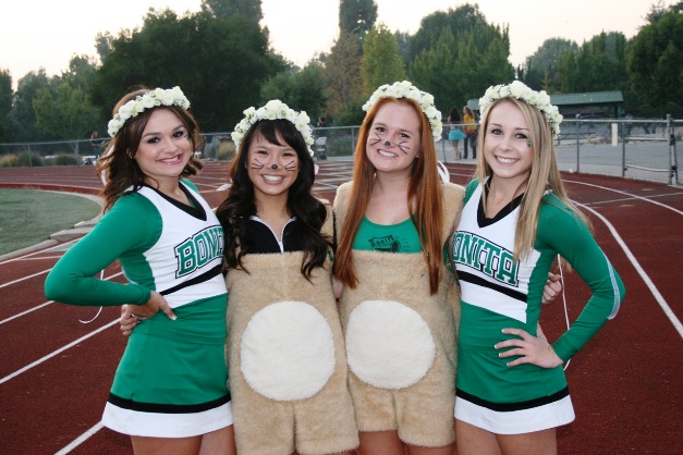 From left, Lindsay Anderson, Amanda Le, Gabby McGarry and Kaylee Eaton are button-cute Bearcat supporters. All photos by Suzana Munson.