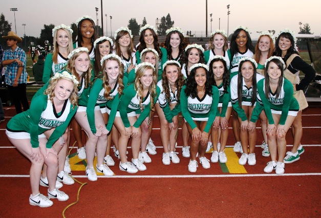 The varsity cheer team had much to cheer about, especially late in the game.