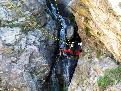 Mountaineers are sometimes called to rescue victims caught between a rock and a hard place.