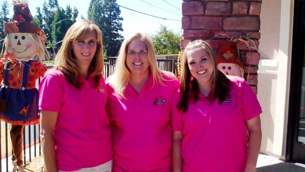 From left, xxx, Debbie Lloyd and Anna Morris are pretty in pink and excited about all the upcoming activities at La Verne's favorite place for kids, the Kiddie Academy.