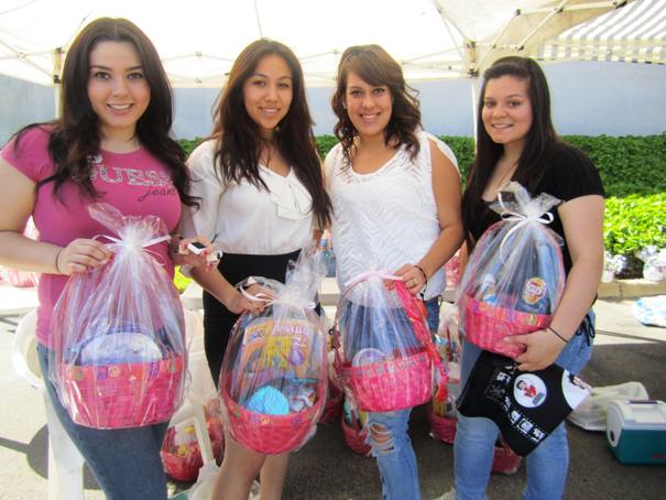 University of La Verne freshmen, from left, Diana Arriaga, Celia Moreno, Marcia Arias and Stephany (cq) Lopez handed out Easter baskets. They are all members of the Phi Sigma Sigma sorority.