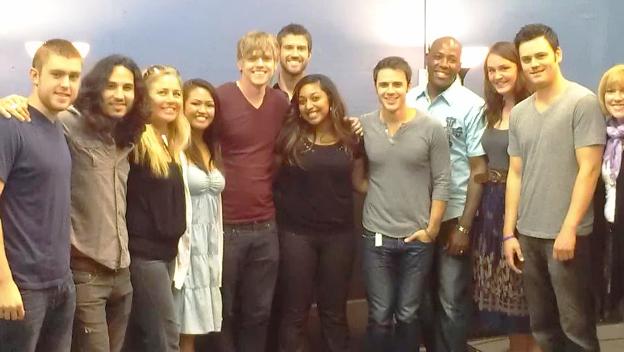 Michelle poses with Kris Allen and his band and her fellow singers at a rehearsal of "Vision of Love."