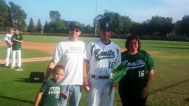 Winning pitcher Alec Garcia with his family on Senior Day