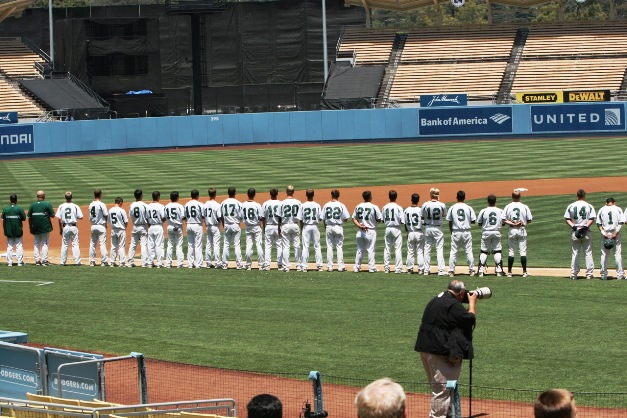 Players line up for the singing of the National Anthem.